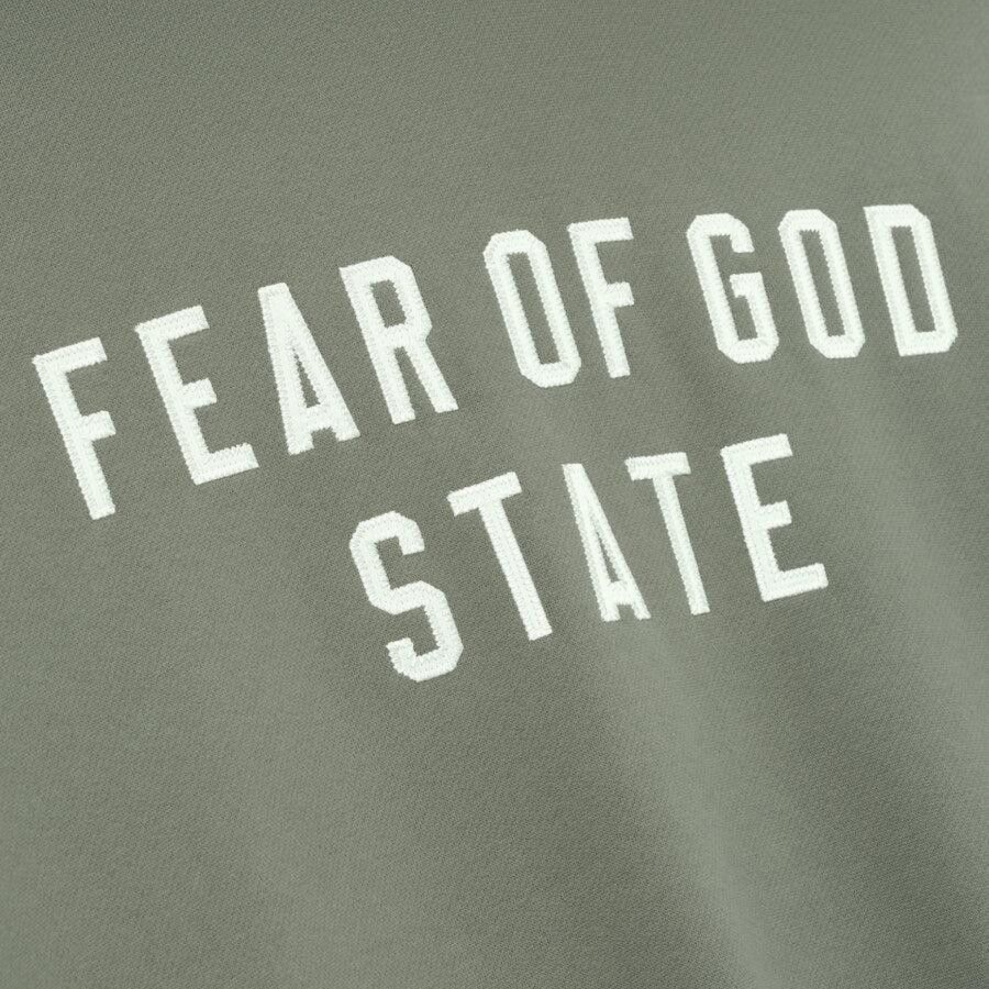 Fear of God Essentials 90s Fit Fleece Hoodie Moss FW25 Front Logo